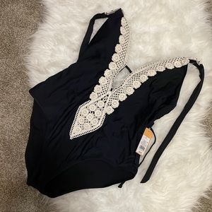 Kona Sol Women’s Black Bathing Suit with White Lace Detail.